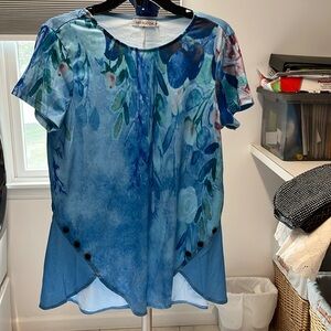 Miss look top. Size medium. Blue with flowers